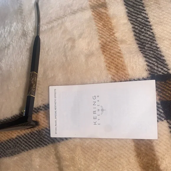 Gucci glasses with authentication card, dust bag, and case